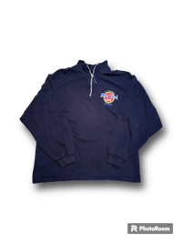 a blue sweatshirt with a logo on it