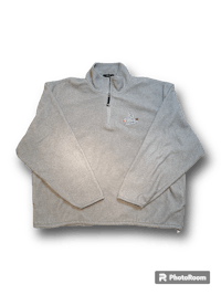 a grey sweatshirt with a logo on it